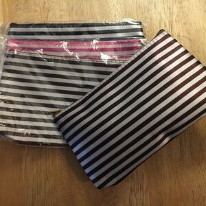 Reseller’s unbranded striped shimmery cosmetic bags bundle